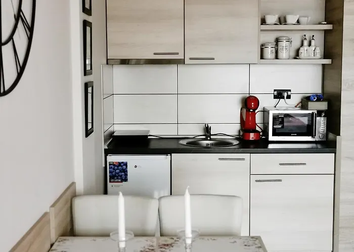 아파트 Sunset Milmari M10 카파오닉